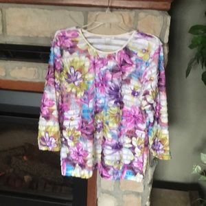 Floral shirt with three-quarter sleeves.